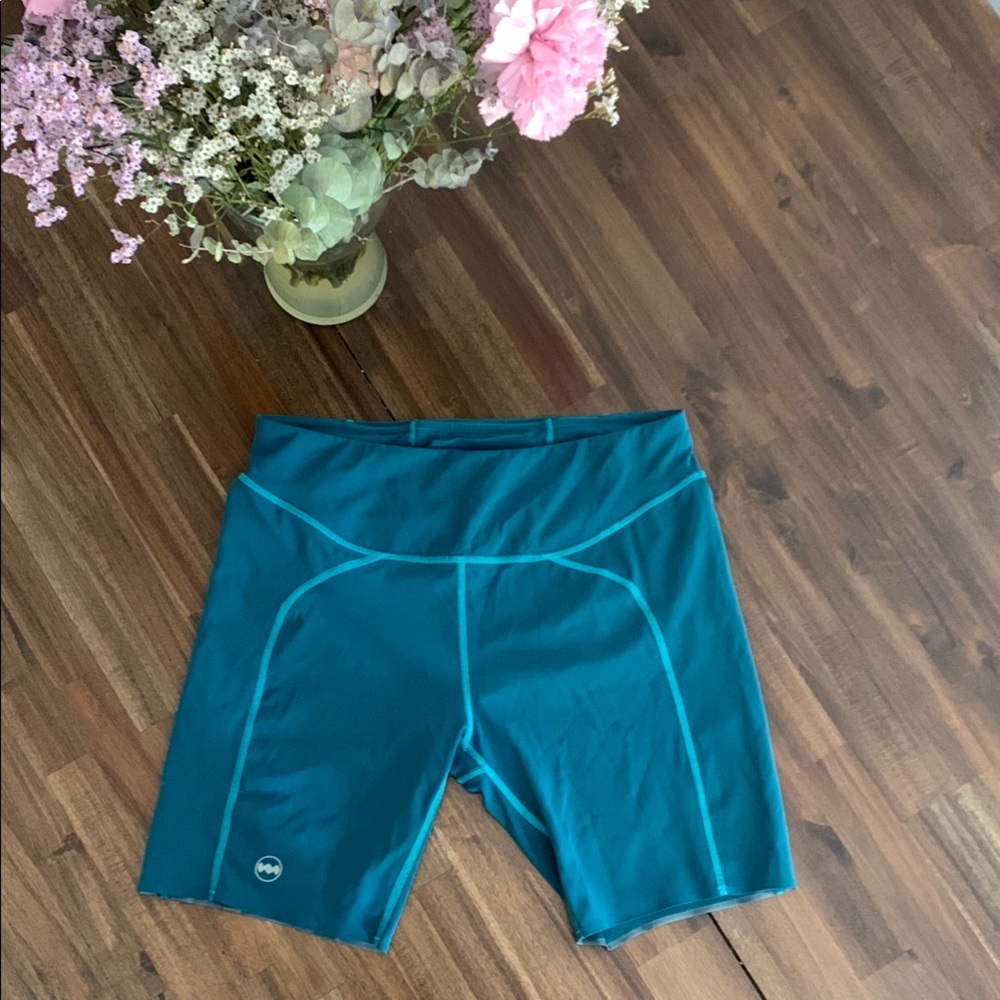 Janji teal/green groundwork 7inch running shorts